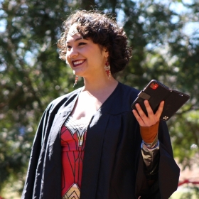 Student in graduation gown 