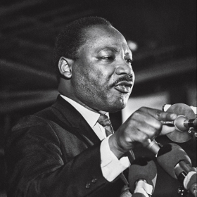 A photo of Dr. Martin Luther King, Jr., shows him speaking in Memphis on the eve of his assassination.