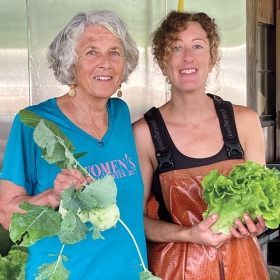 Polly Keller Vanasse ’73  with Gaining Ground farm manager Anna Kelchlin