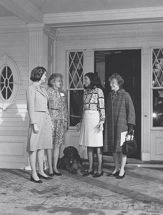 From left: Wellesley President Barbara W. Newell; Irene Murphy, executive director of the Federation of Organizations for Professional Women; Carolyn Elliott ’59, founding director of theWellesley Center for Research on Women; and an unidentified woman at Cheever House in 1975