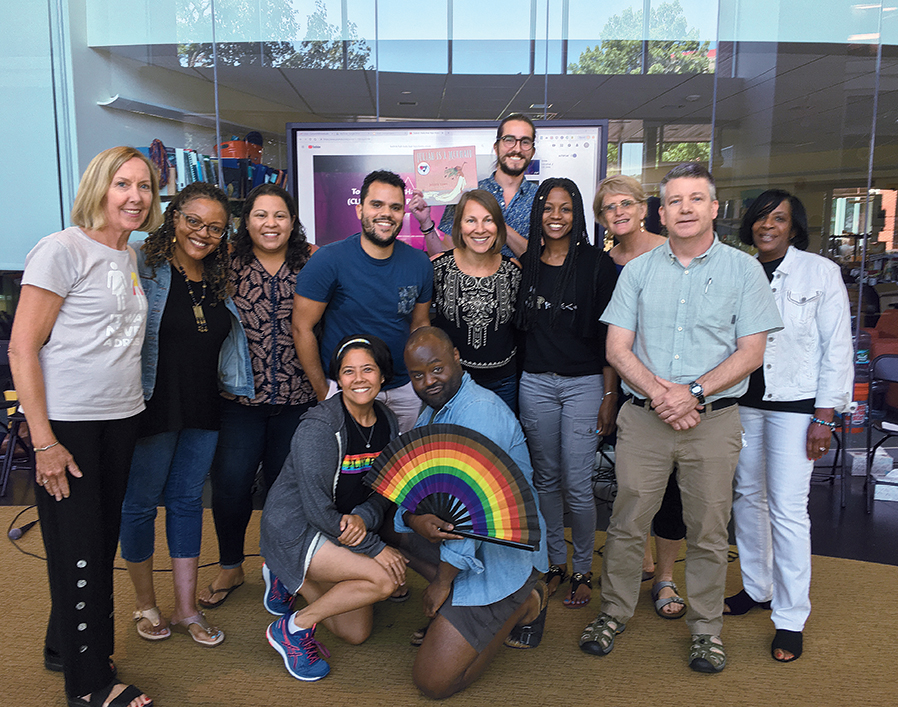 A group of school leaders trained with SEED co-​director Motoko Maegawa and staff member Kirk LaRue (front).