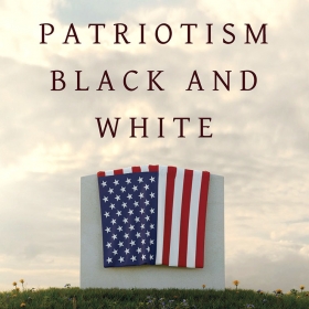 The cover image of Patriotism Black and White depicts an American flag draped over a white marble tombstone.