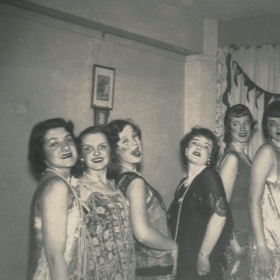 The Wellesley Widows pose in flapper dresses in the 1940s