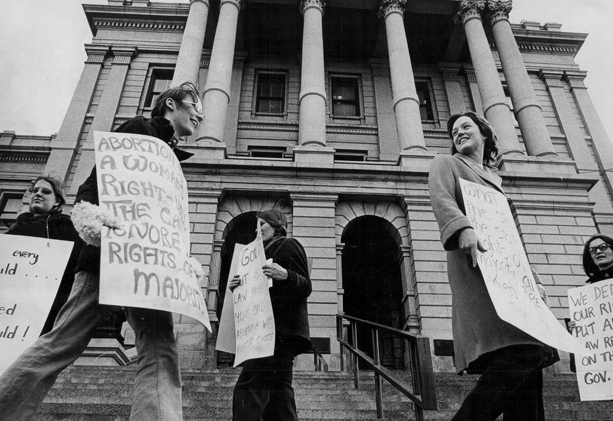In 1972, members of the Mountain State Abortion Coalition form a picket line at the State Capitol in Denver.