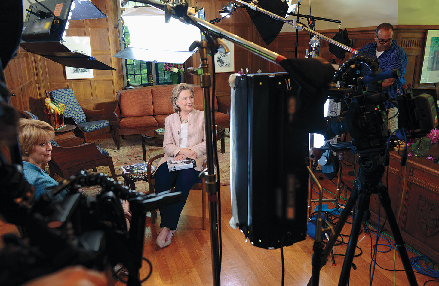 2014: Jane Pauley of CBS Sunday Morning and Hillary Rodham Clinton ’69 prepare for a television interview in the president’s office during reunion 2014.