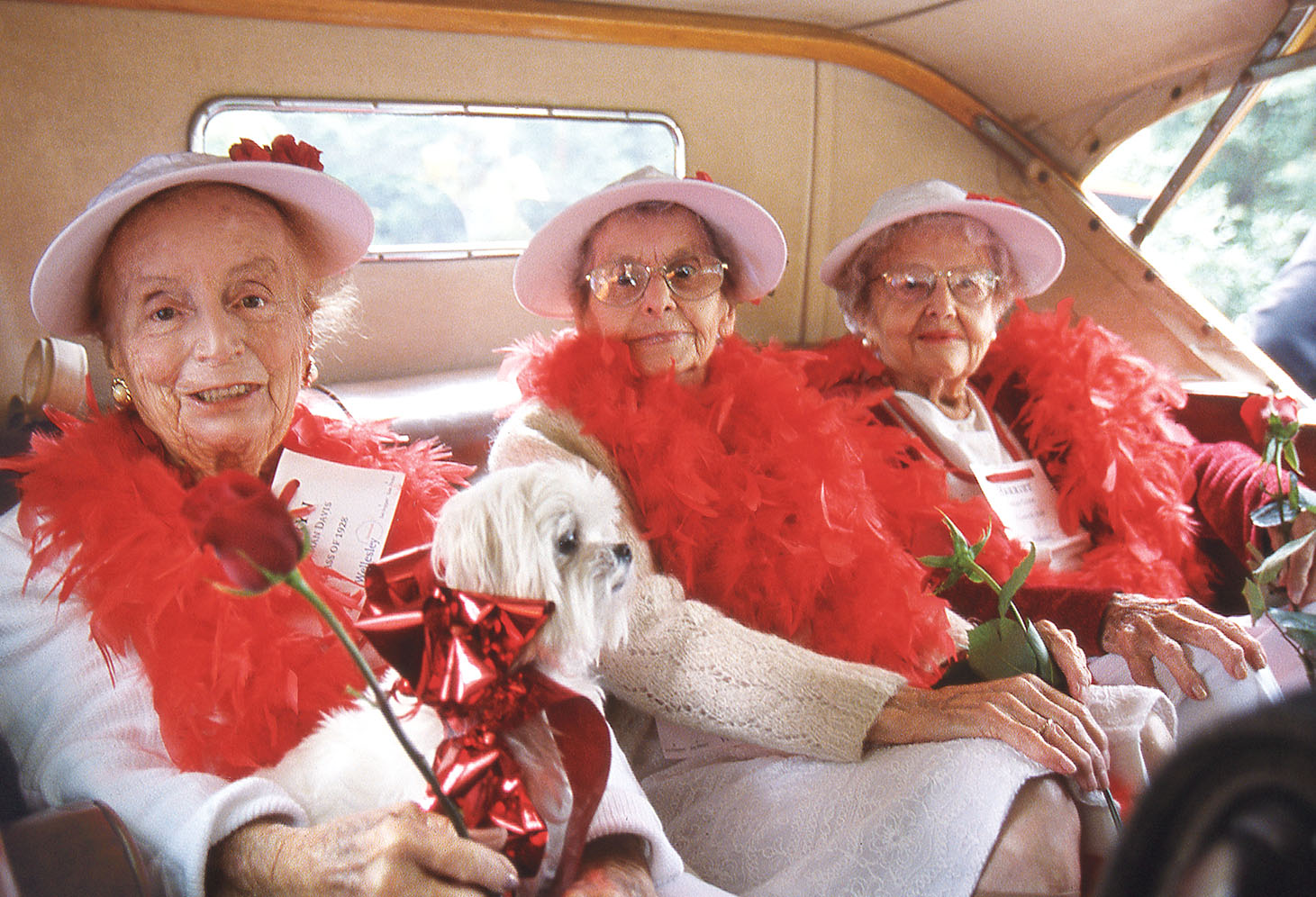 1998: Wellesley Trustee Kathryn Wasserman Davis ’28 (left) and classmates Marjorie Scoboria and Trustee Harriet Segal Cohn awaiting the start of the alumnae parade in an antique car at their 70th reunion