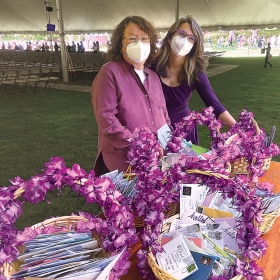 Staff members Catherine O'Neill Grace and Lisa Scanlon Mogolov '99 prepare to distribute letters to the senior class.