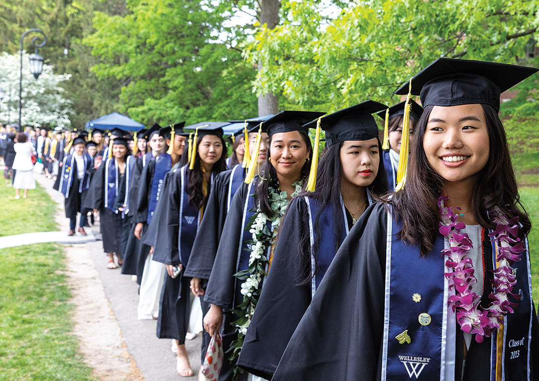 Members of the class of ’23 cheer as degrees are conferred during the commencement ceremony on May 20.