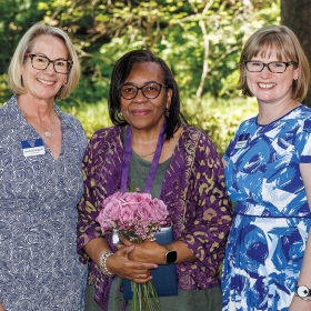 Photo of Laura Wood Cantopher ’84, former WCAA president; Debra DeVaughn ’74; and Kathryn Harvey Mackintosh ’03, executive director of the WCAA.