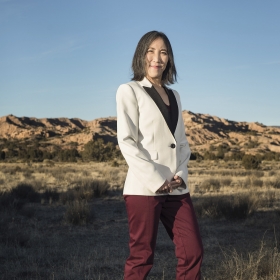 Liz Miranda ’02 campaigning in Massachusetts; Lisa Shin ’91 poses in the New Mexico desert.