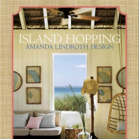 The cover of "Island Hopping" shows a seaside living room open to the sun and air, filled with casual furniture and a wicker swing.