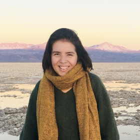 A photo portrait of Anani Galindo ’19 standing in a mountainous landscape in Chile