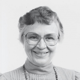 A black-and-white photo portrait shows a smiling Alice Birmingham Robinson ’46,.