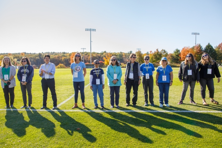 The 2020 and 2020 Hall of Fame recipients standing on Wellesley's soccer field together