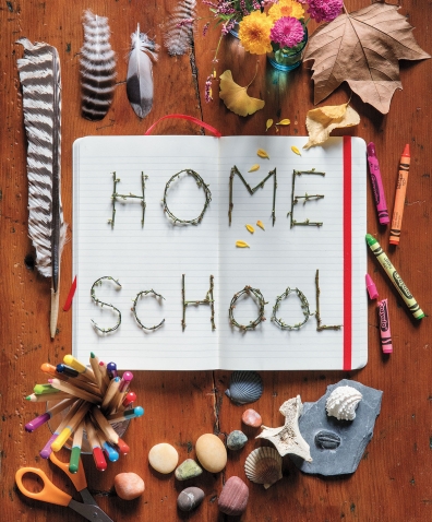 A photo collage around the words "Home School" contains rocks and fatehrs, crayons, leaves, and child-size scissors.