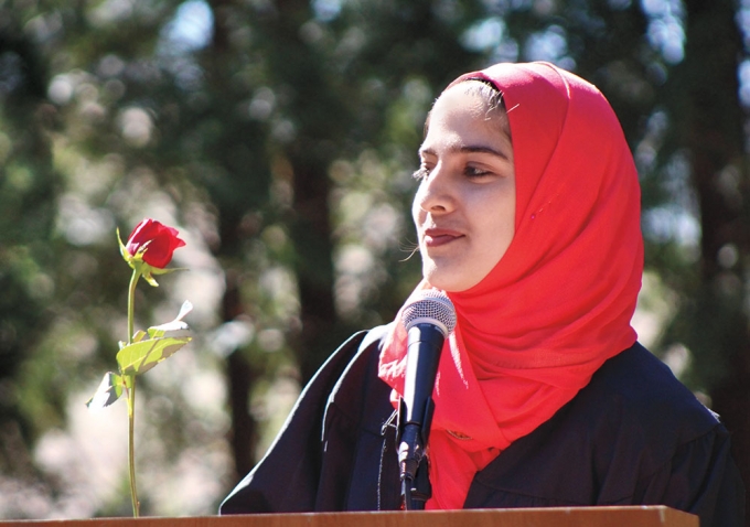 Maheen Akram ’20 holds a red rose during faux-mencement.