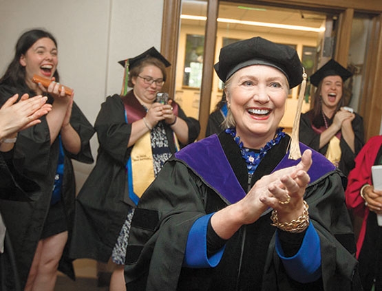 Hillary Rodham Clinton ’69 and members of the class of ’17 greet each other before Commencement.