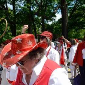 The class of 1972 wears red gloves and cowboy hats