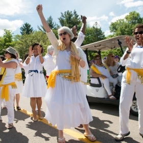 The WCAA board of directors cheers at the alumnae parade.