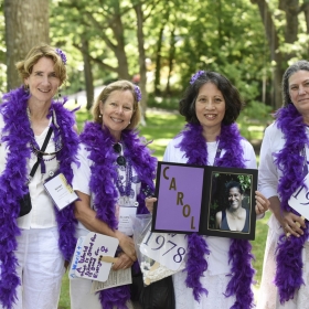 Class of ’78 friends carried a photo of their friend and classmate Carol Allen, who died in March, in the alumnae parade. Pictured are Mimi Mengis, Elaine Claar Campbell, Susan Yee Jong (holding the photo of Carol), and Janie Schwab.