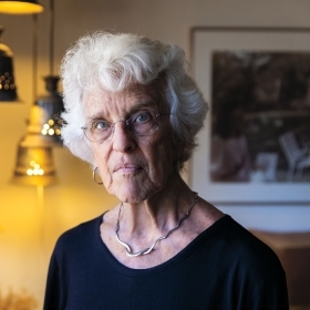 A photo shows Nancy Stearns '61 in her New York City apartment.