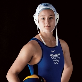 Claire Whitaker ’19 poses in her water polo swimming gear.