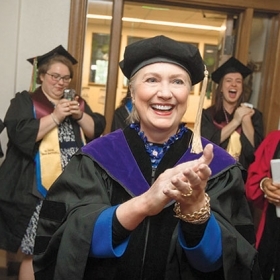 Hillary Rodham Clinton ’69 and members of the class of ’17 greet each other before Commencement.