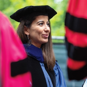 A faculty member at commencement