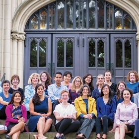 Photo of Career Education staff sitting on the steps of Green Hall